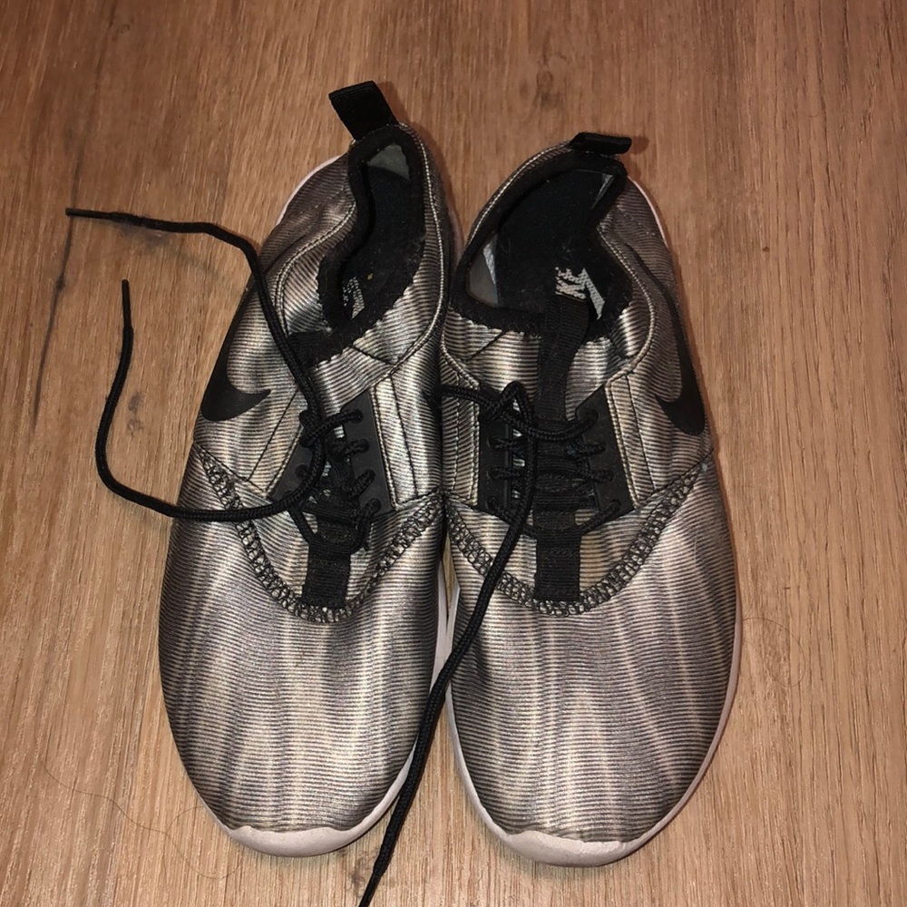 Silver Nike shoe